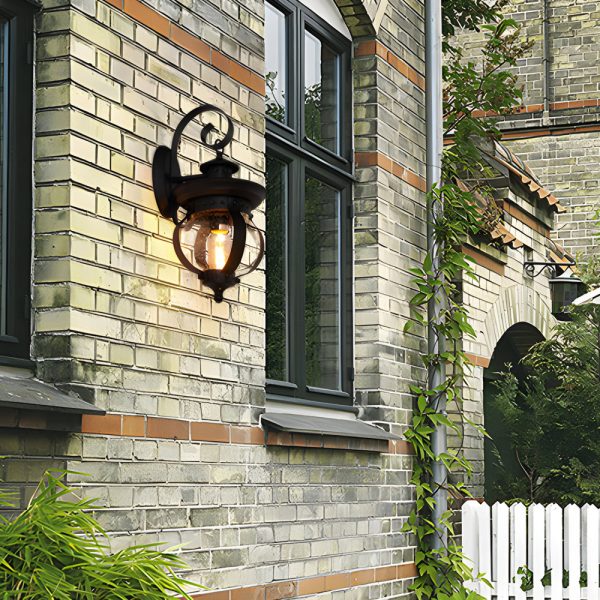 1-Light Seeded Glass Globe LED Outdoor Wall Lantern with Curved Arm - Image 3