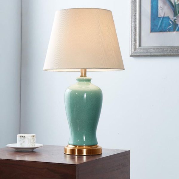 Contemporary Nordic Ceramic Fabric Elliptical Base 1-Light Table Lamp For Bedroom And Living Room - Image 3