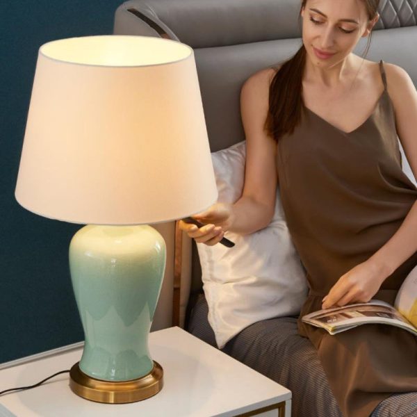 Contemporary Nordic Ceramic Fabric Elliptical Base 1-Light Table Lamp For Bedroom And Living Room - Image 14